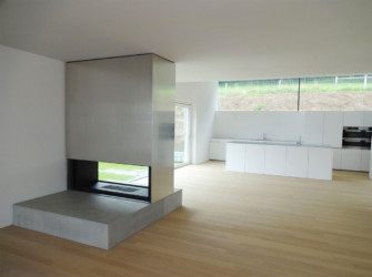 Cheminée de salon 2 faces tunnel avec feu de bois