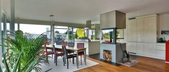 Cheminée de salon 2 faces tunnel avec feu de bois